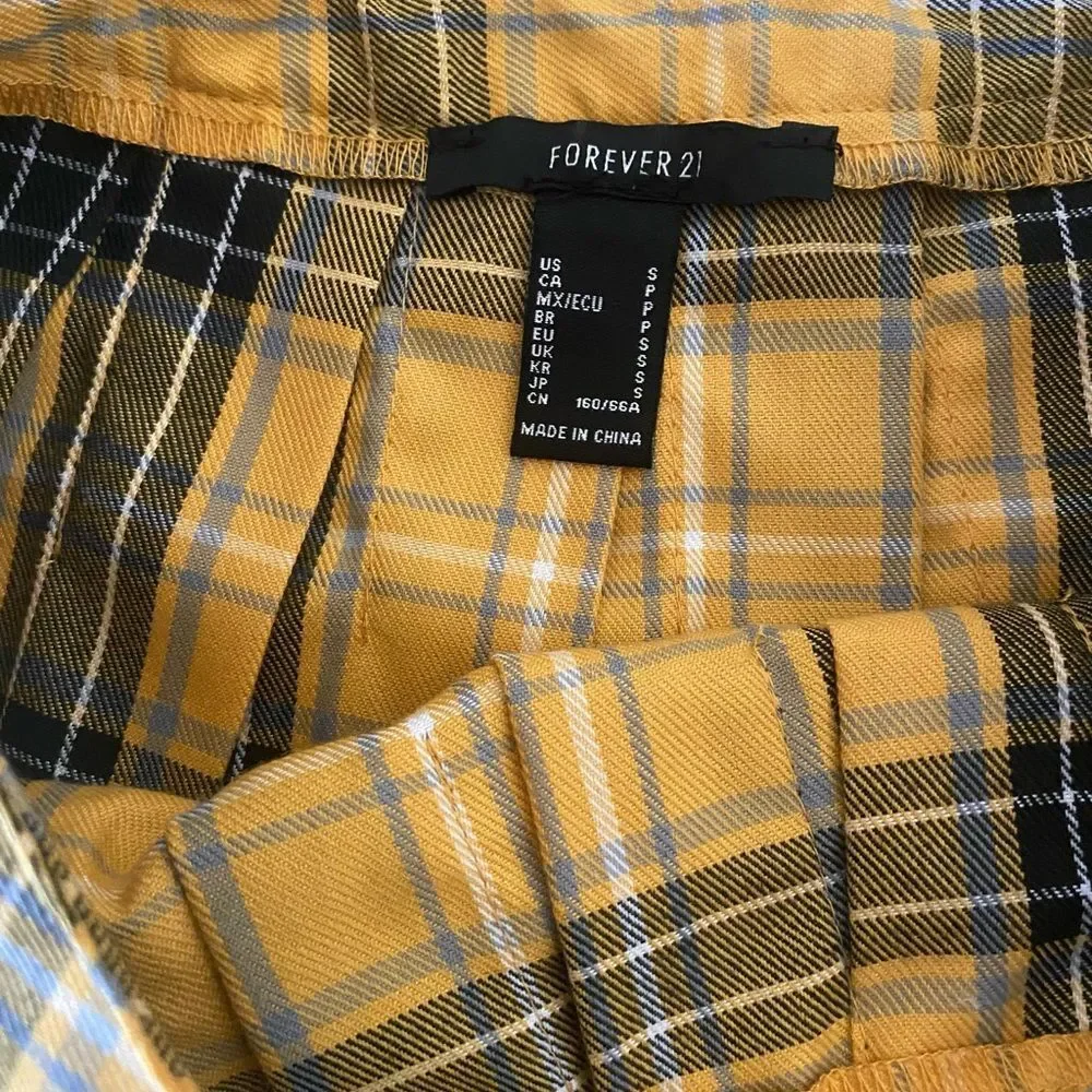 Bundle of pleaded plaid mini skirts
